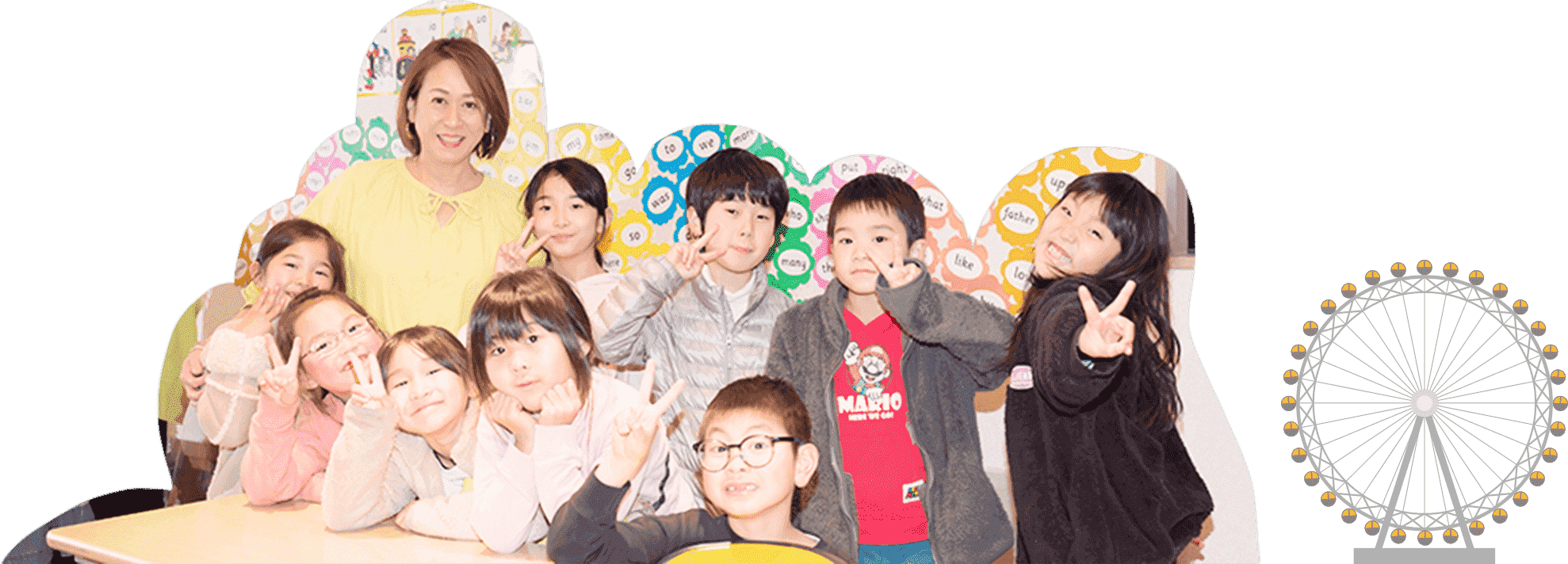 英語のたまごの代表 原 操と生徒の集合写真